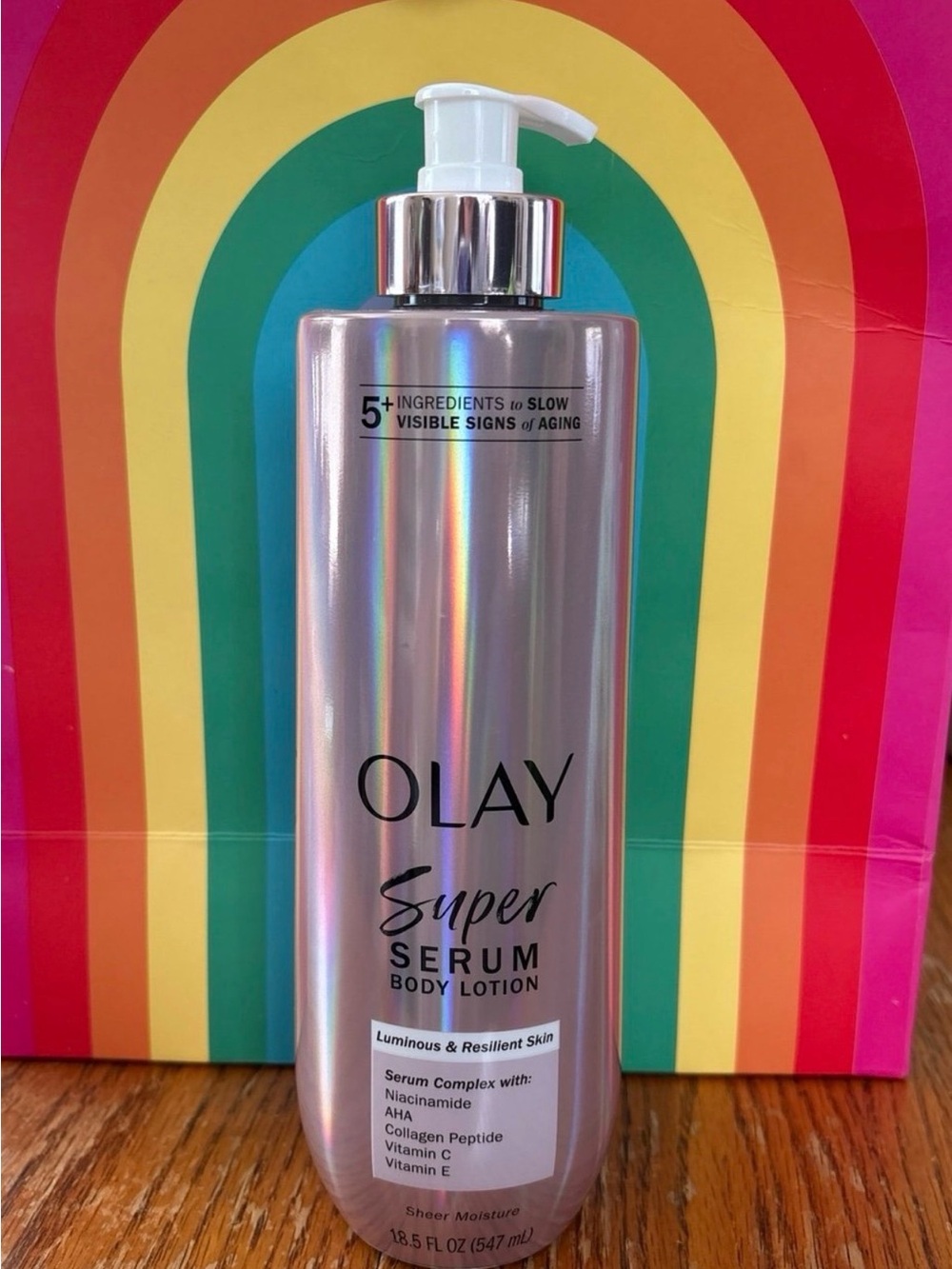 OLAY Super Serum Body Lotion - Iridescent Pearl Pink Bottle